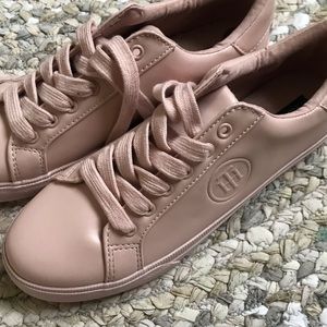 Pink Tommy Hilfiger shoes.
